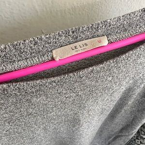 Woman’s stretchy sweater.